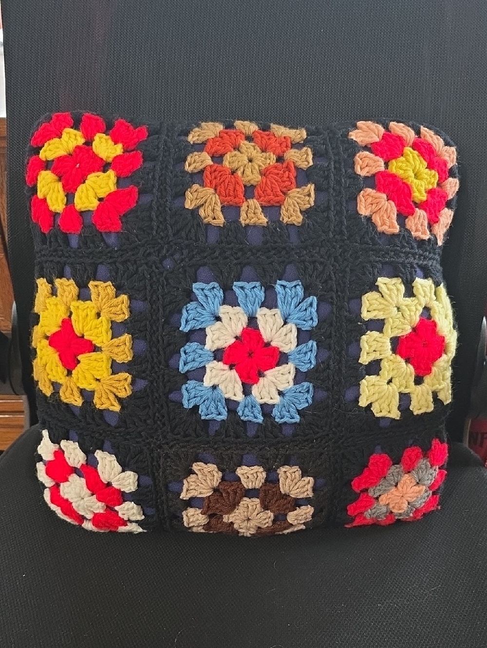 Handmade Black Crochet Granny Square Throw Pillow with Multicolor Accents